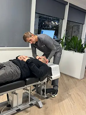 Dr. Andrew Winger adjusting a patient at Lakeside Spine and Wellness in Renton, WA