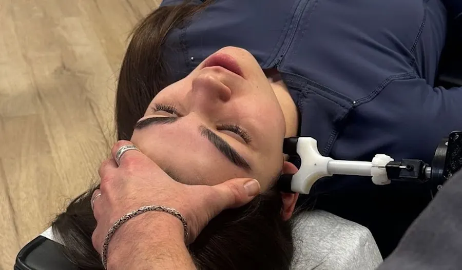 Instrument-assisted cervical adjustment at Lakeside Spine and Wellness